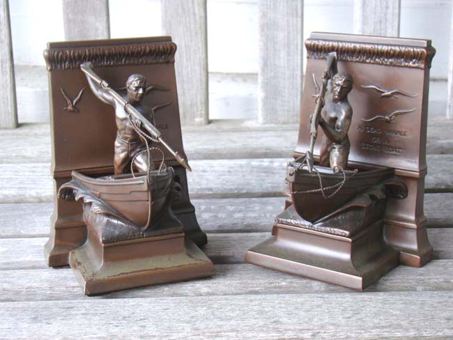 A pair of New Bedford Whaler Memorial bookends made by Jennings Brothers circa 1930